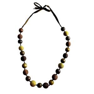 Vintage UNA Store Sculpted Wooden Beaded Necklace on Ribbon